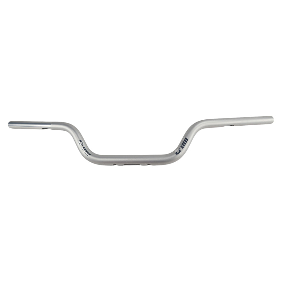 The ODI 1-1/8" V-Twin Tapered Moto Bars - Silver - TBW handlebar of a bicycle with a white background.