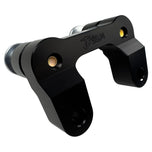 The TC Bros. Pro Series Riser Adapter features black anodized metal, two mounting holes, silver cylindrical ends, and engraved branding—ideal for upgrading 2006-2013 Harley-Davidson Street Glide handlebars.