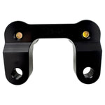 TC Bros. Pro Series Handlebar Riser Adapter for 2006-2013 Harley-Davidson Street Glide, with an ignition lock retainer kit and TC Bros. branding, features a machined black finish and two mounting holes.