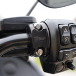 Close-up of TC Bros. Pro Series Clutch and Brake Perch Clamps for 1984-Up Harley-Davidson motorcycles, designed for 1" handlebars, showing control buttons, bolts, and the engraved TC Bros. brand name.