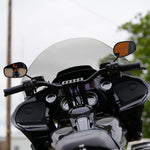 Close-up of TC Bros. Pro Series Clutch and Brake Perch Clamps for 1984-Up Harley-Davidson motorcycles, designed for 1" handlebars, showing control buttons, bolts, and the engraved TC Bros. brand name.