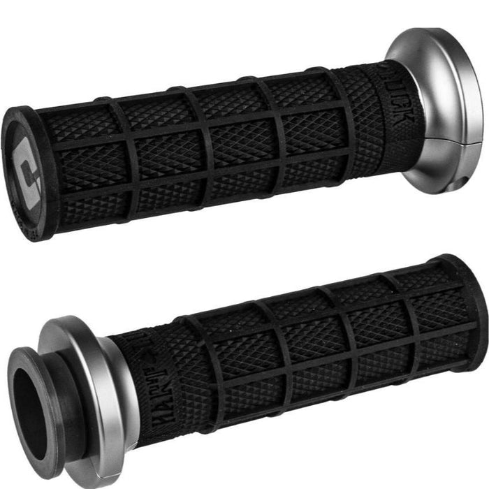 Two black Waffle Lock-On V-Twin Grips for Harley motorcycles with Throttle by Wire, featuring a textured design in black and graphite. These ODI grips, adorned with silver end caps and a metallic logo, add both style and comfort to your ride.