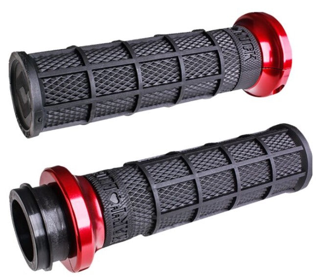 Close-up view of two ODI Waffle Lock-On V-Twin Grips for Harley with black textured surfaces and red metallic end caps, designed for Throttle by Wire.