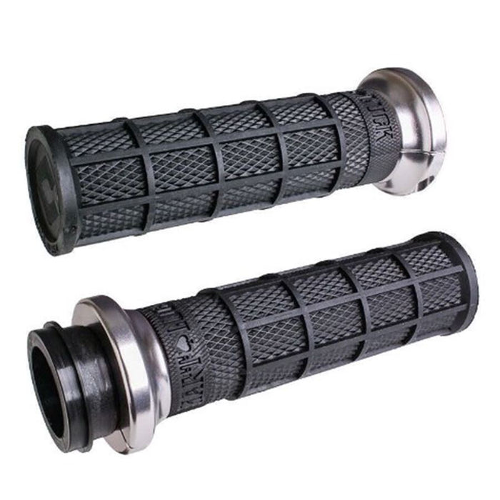 The ODI Waffle Lock-On V-Twin Grips for Harley - Throttle by Wire in Black/Silver feature textured surfaces and metallic ends, making them perfect for your motorcycle.