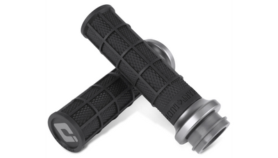 Seven pairs of ODI Hart-Luck Lock-on Grips for Harley-Davidson Cable Throttle, featuring black textured MX-style full-waffle handles with end caps in red, black, silver, or bronze—also suitable for bicycles.