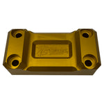 Three rectangular TC Bros. Top Clamps for Pro Series Truss Riser are shown in silver, black, and gold on a white background, each featuring four corner holes and recessed detailing in the center.