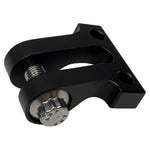 The TC Bros. Gauge Relocation Bracket for Pro Series Truss Risers includes one silver and one black metal clamp with knurled screw mechanisms, plus four screws—perfect for mounting your motorcycle gauge.