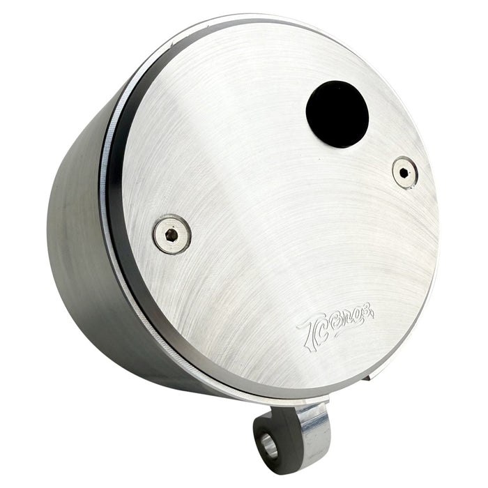 Two cylindrical motorcycle tachometer bezels from TC Bros., including the Pro Series 4 inch Gauge Relocation Bezel for Harley Davidson, in black and silver finishes with similar gauge faces featuring numbers and a red needle.