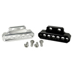 Two cylindrical motorcycle tachometer bezels from TC Bros., including the Pro Series 4 inch Gauge Relocation Bezel for Harley Davidson, in black and silver finishes with similar gauge faces featuring numbers and a red needle.