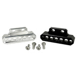 Two cylindrical motorcycle tachometer bezels from TC Bros., including the Pro Series 4 inch Gauge Relocation Bezel for Harley Davidson, in black and silver finishes with similar gauge faces featuring numbers and a red needle.