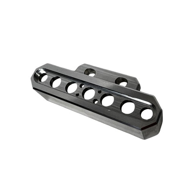 The TC Bros. Pro Series Indicator Light Relocation Kit is a beveled-edge, rectangular metal component with multiple holes, designed to mount indicator lights on select Harley-Davidson risers for custom setups.