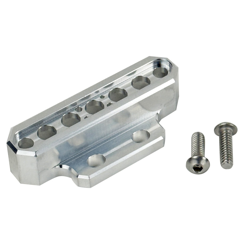 Two cylindrical motorcycle tachometer bezels from TC Bros., including the Pro Series 4 inch Gauge Relocation Bezel for Harley Davidson, in black and silver finishes with similar gauge faces featuring numbers and a red needle.