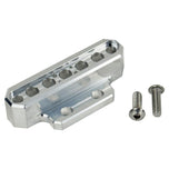 Two cylindrical motorcycle tachometer bezels from TC Bros., including the Pro Series 4 inch Gauge Relocation Bezel for Harley Davidson, in black and silver finishes with similar gauge faces featuring numbers and a red needle.