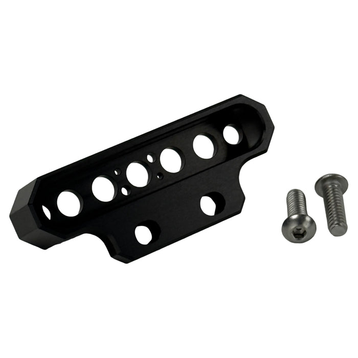 Two cylindrical motorcycle tachometer bezels from TC Bros., including the Pro Series 4 inch Gauge Relocation Bezel for Harley Davidson, in black and silver finishes with similar gauge faces featuring numbers and a red needle.