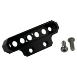 Two cylindrical motorcycle tachometer bezels from TC Bros., including the Pro Series 4 inch Gauge Relocation Bezel for Harley Davidson, in black and silver finishes with similar gauge faces featuring numbers and a red needle.
