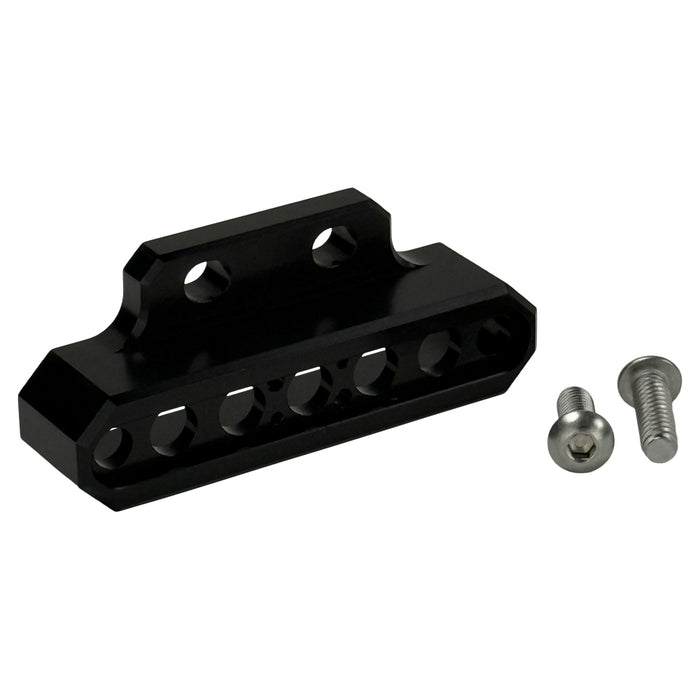 Two cylindrical motorcycle tachometer bezels from TC Bros., including the Pro Series 4 inch Gauge Relocation Bezel for Harley Davidson, in black and silver finishes with similar gauge faces featuring numbers and a red needle.