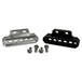 Two cylindrical motorcycle tachometer bezels from TC Bros., including the Pro Series 4 inch Gauge Relocation Bezel for Harley Davidson, in black and silver finishes with similar gauge faces featuring numbers and a red needle.