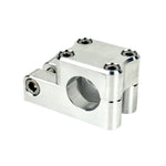 Close-up view of the TC Bros. Pro Series 1" Universal Gauge Mount, a shiny chrome-plated bracket with cylindrical parts by TC Bros., perfect for Harley-Davidson gauge relocation.