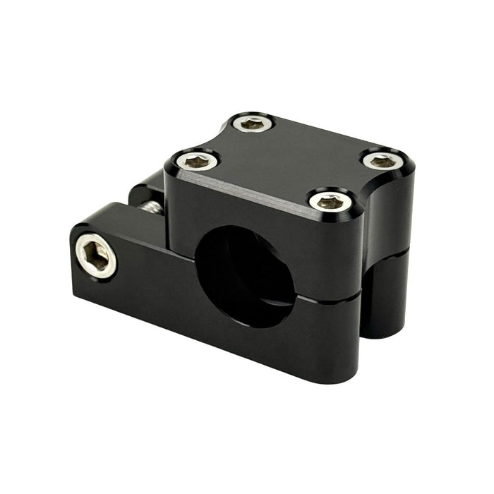 Close-up view of the TC Bros. Pro Series 1" Universal Gauge Mount, a shiny chrome-plated bracket with cylindrical parts by TC Bros., perfect for Harley-Davidson gauge relocation.