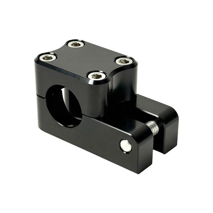 Close-up view of the TC Bros. Pro Series 1" Universal Gauge Mount, a shiny chrome-plated bracket with cylindrical parts by TC Bros., perfect for Harley-Davidson gauge relocation.