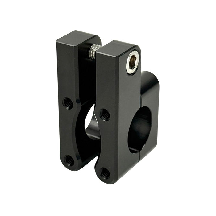 Close-up view of the TC Bros. Pro Series 1" Universal Gauge Mount, a shiny chrome-plated bracket with cylindrical parts by TC Bros., perfect for Harley-Davidson gauge relocation.