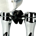 Close-up view of the TC Bros. Pro Series 1" Universal Gauge Mount, a shiny chrome-plated bracket with cylindrical parts by TC Bros., perfect for Harley-Davidson gauge relocation.