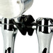 Close-up view of the TC Bros. Pro Series 1" Universal Gauge Mount, a shiny chrome-plated bracket with cylindrical parts by TC Bros., perfect for Harley-Davidson gauge relocation.