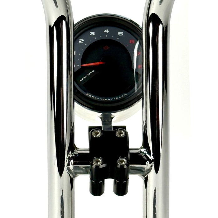 Close-up view of the TC Bros. Pro Series 1" Universal Gauge Mount, a shiny chrome-plated bracket with cylindrical parts by TC Bros., perfect for Harley-Davidson gauge relocation.