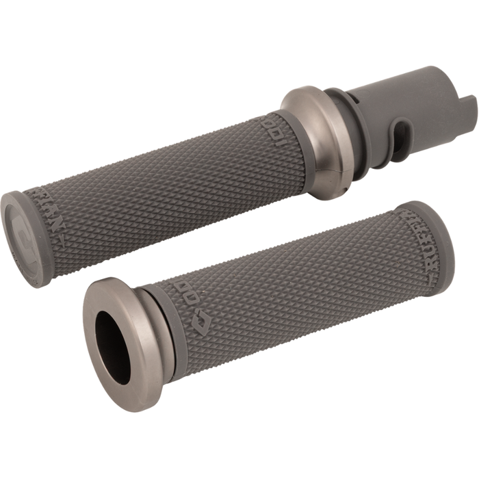 A black cylindrical tube with a flange sits on a white background—the Moto Iron® Throttle Tube for First Generation Harley-Davidson TBW, ideal for Gen 1 models or use with slide-on grips.