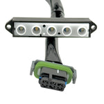 The Guerrilla Cables Speedometer Relocation Harness for 2014-2022 Harley-Davidson Sportster (Single Gauge) is a black electrical cable featuring a rectangular connector on one end and a multi-pin connector on the other, coiled into a loose loop—designed by Guerrilla Cables as a plug-and-play solution for relocating your Sportster’s speedometer.