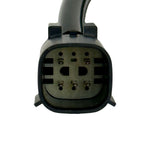 The Guerrilla Cables Speedometer Relocation Harness for 2014-2022 Harley-Davidson Sportster (Single Gauge) is a black electrical cable featuring a rectangular connector on one end and a multi-pin connector on the other, coiled into a loose loop—designed by Guerrilla Cables as a plug-and-play solution for relocating your Sportster’s speedometer.