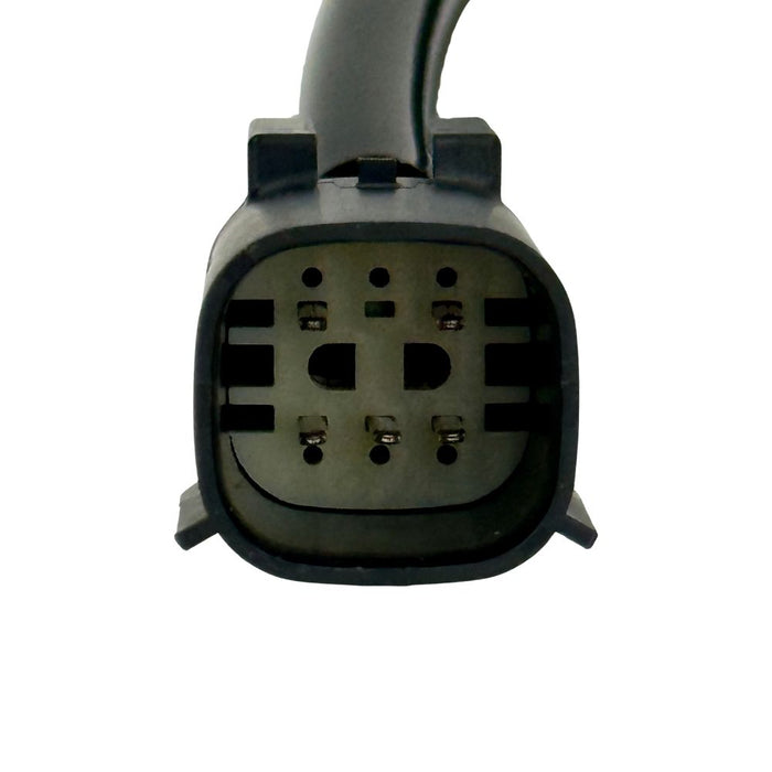 The Guerrilla Cables Speedometer Relocation Harness for 2014-2022 Harley-Davidson Sportster (Single Gauge) is a black electrical cable featuring a rectangular connector on one end and a multi-pin connector on the other, coiled into a loose loop—designed by Guerrilla Cables as a plug-and-play solution for relocating your Sportster’s speedometer.