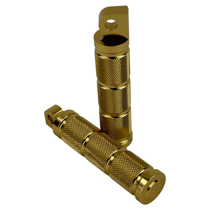 Two Moto Iron® Knurled Billet Footpegs for Harley-Davidson—Gold, shown upright and flat on a white background. Made from billet aluminum with textured grips and mounting holes—ideal genuine-style footpegs.