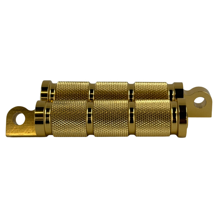 Two Moto Iron® Knurled Billet Footpegs for Harley-Davidson—Gold, shown upright and flat on a white background. Made from billet aluminum with textured grips and mounting holes—ideal genuine-style footpegs.