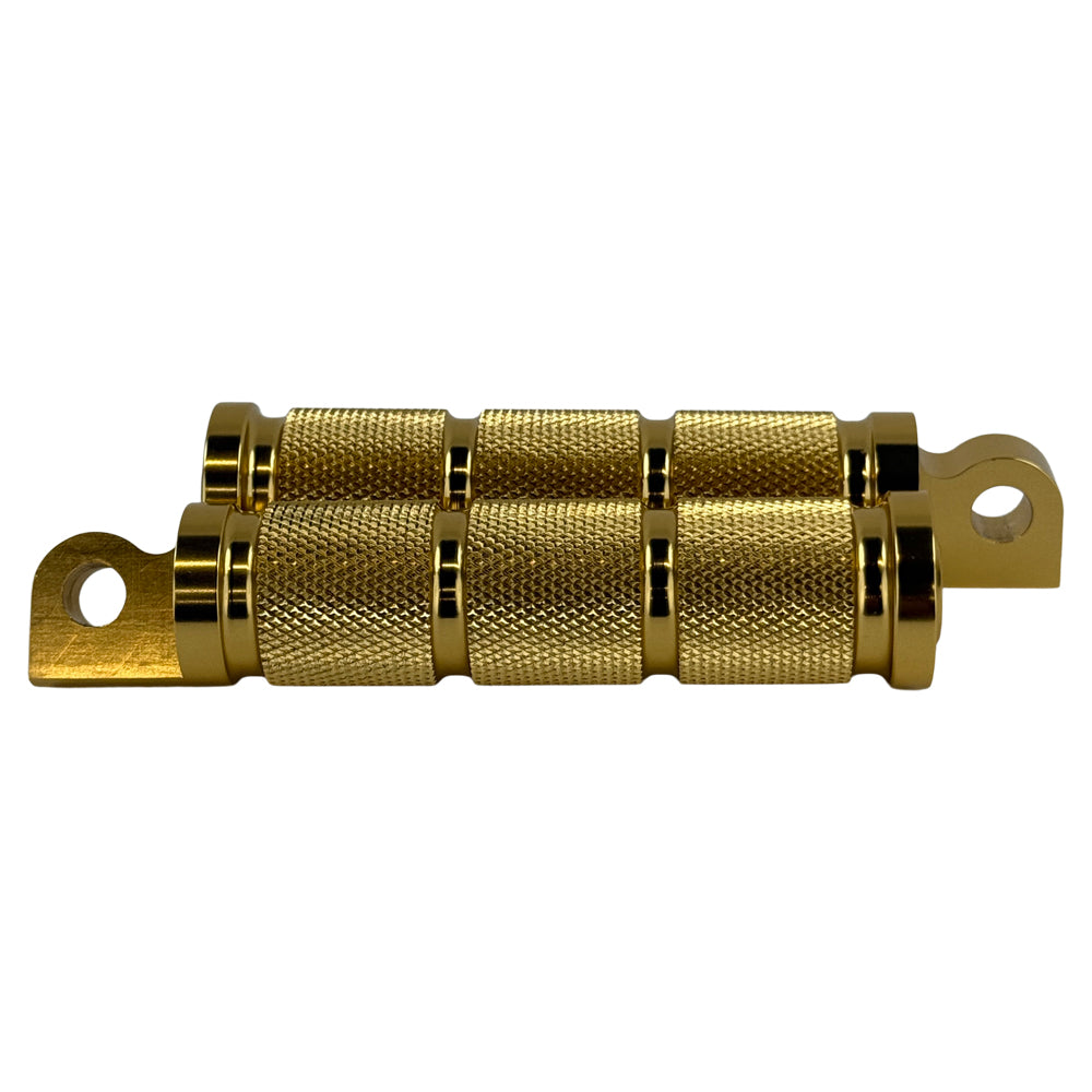 Two Moto Iron® Knurled Billet Footpegs for Harley-Davidson—Gold, shown upright and flat on a white background. Made from billet aluminum with textured grips and mounting holes—ideal genuine-style footpegs.