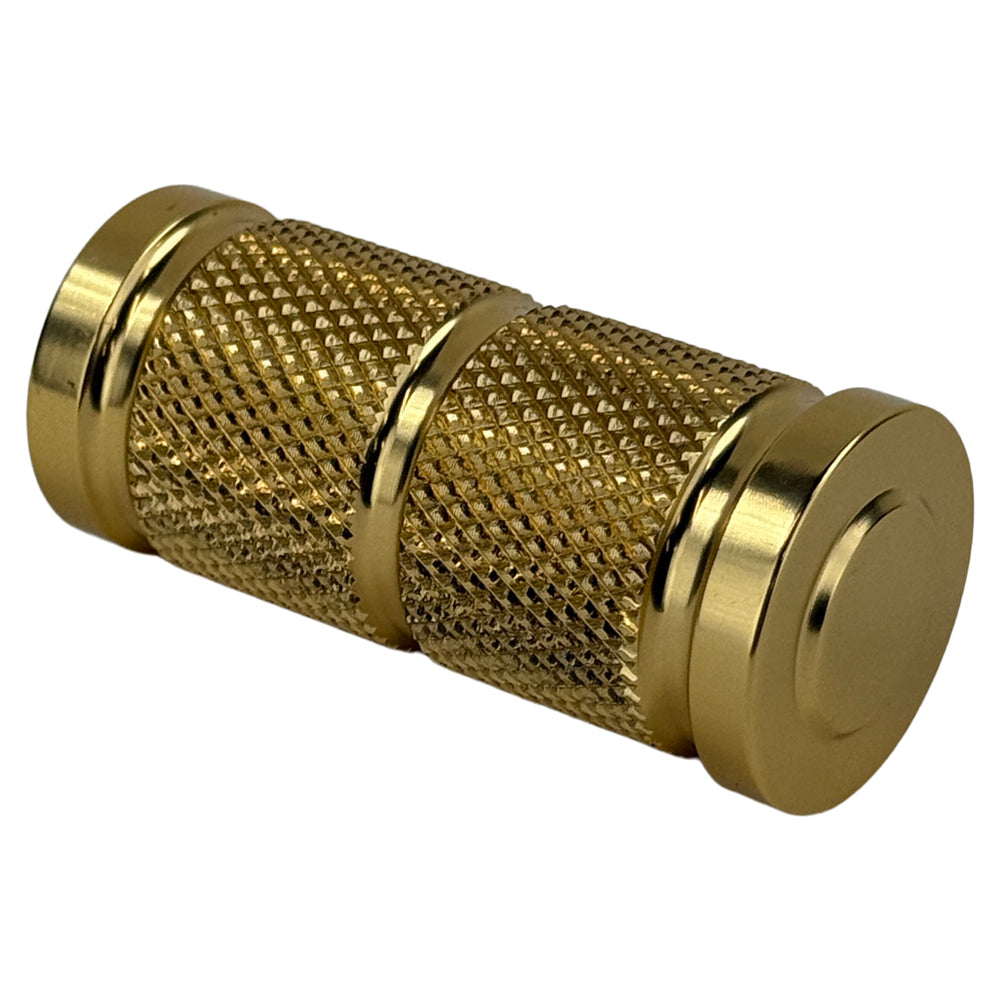 The Moto Iron® Knurled Billet Shift/Brake Peg for Harley-Davidson in gold features a cylindrical, aluminum design with knurled grip and smooth ends—perfect as a custom brake peg for your bike.