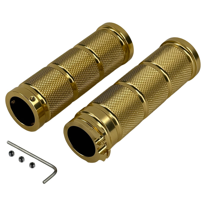 Three Moto Iron® Knurled Billet Grips for Harley-Davidson in silver, black, and gold are shown upright against a white background.