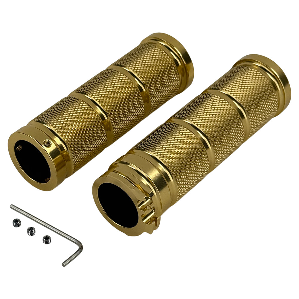 Three Moto Iron® Knurled Billet Grips for Harley-Davidson in silver, black, and gold are shown upright against a white background.