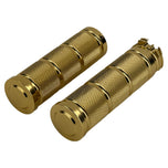 Three Moto Iron® Knurled Billet Grips for Harley-Davidson in silver, black, and gold are shown upright against a white background.