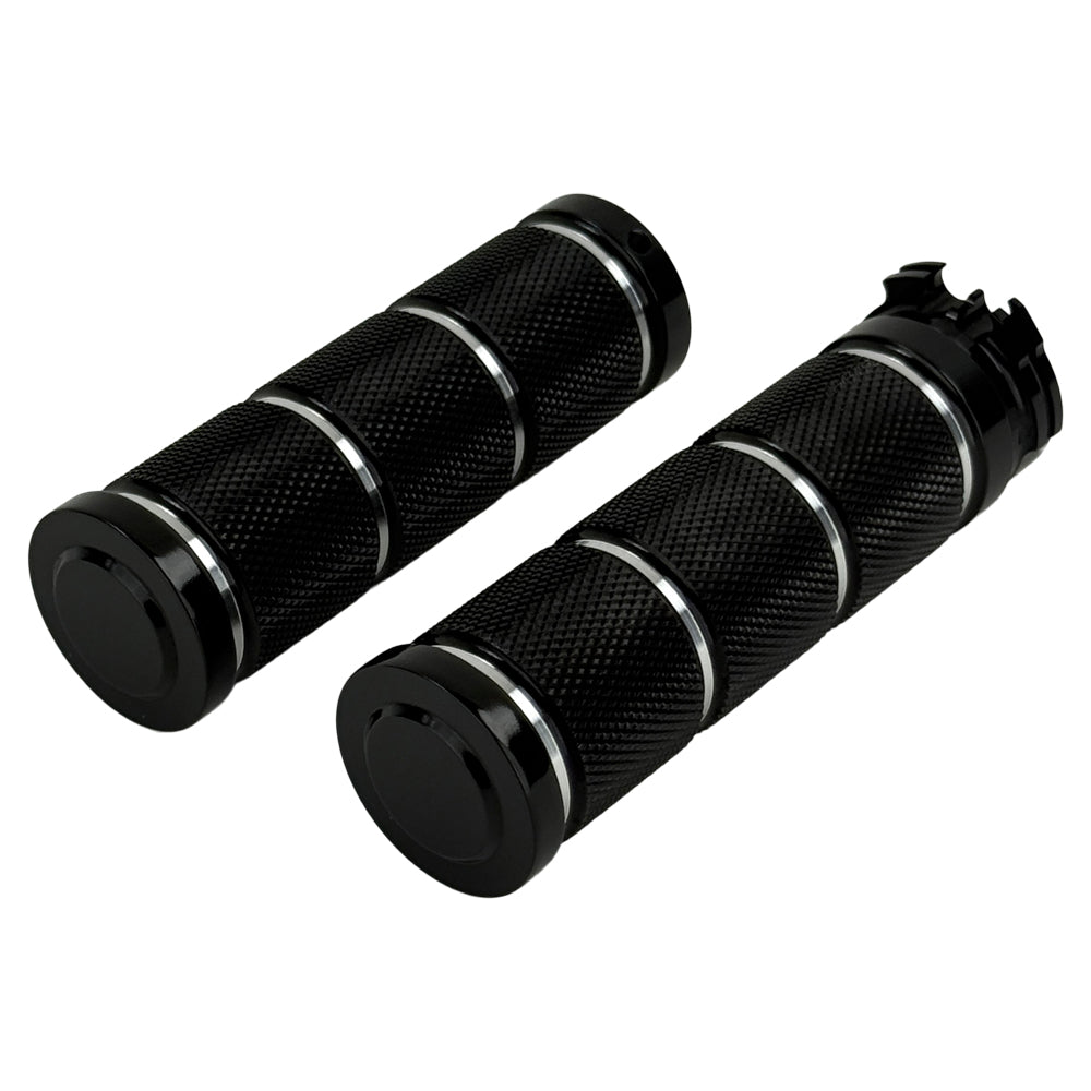 Three Moto Iron® Knurled Billet Grips for Harley-Davidson in silver, black, and gold are shown upright against a white background.