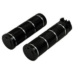 Three Moto Iron® Knurled Billet Grips for Harley-Davidson in silver, black, and gold are shown upright against a white background.