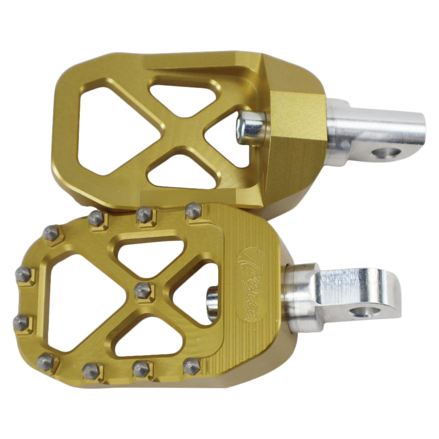 A pair of gold TC Bros. Pro Series Gold MX Foot Pegs for Harley Davidson Models for a TC Bros. rider on a white background.