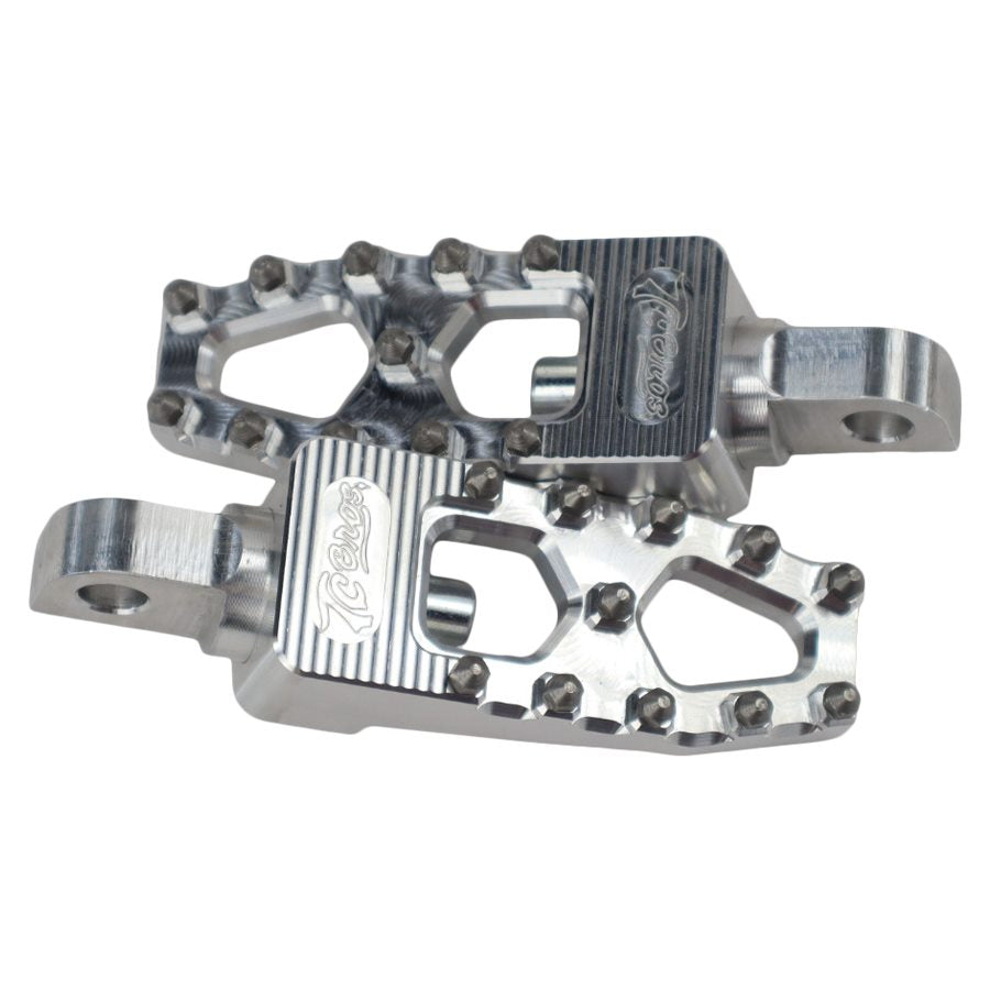 A pair of aluminum TC Bros. Pro Series MX Lite Foot Pegs for Harley Davidson Models on a white background.