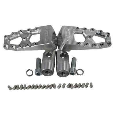 A pair of TC Bros. Pro Series MX Lite Foot Pegs for Harley Davidson Models with high traction, bolts, and nuts.