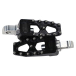 Three TC Bros. Pro Series MX Lite Foot Pegs for Harley Davidson models, featuring metallic spiked surfaces, are arranged side by side in silver, black, and gold.