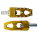 Three TC Bros. Pro Series MX Lite Foot Pegs for Harley Davidson models, featuring metallic spiked surfaces, are arranged side by side in silver, black, and gold.