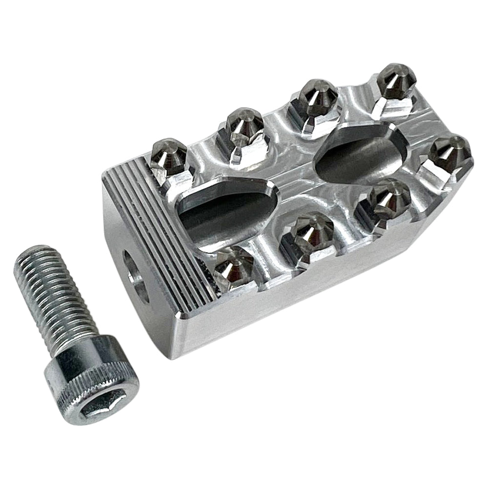 Three TC Bros. Pro Series MX Shifter/Brake Pegs for Harley Davidson, available in silver, black, and gold with multiple spikes, are shown with a metal bolt.