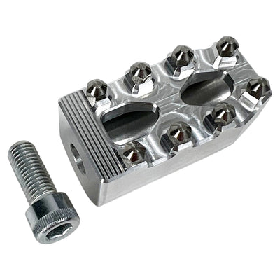 Three TC Bros. Pro Series MX Shifter/Brake Pegs for Harley Davidson, available in silver, black, and gold with multiple spikes, are shown with a metal bolt.