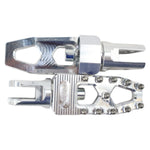 Three TC Bros. Pro Series MX Lite Foot Pegs for Harley Davidson models, featuring metallic spiked surfaces, are arranged side by side in silver, black, and gold.