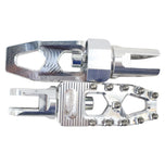 Three TC Bros. Pro Series MX Lite Foot Pegs for Harley Davidson models, featuring metallic spiked surfaces, are arranged side by side in silver, black, and gold.